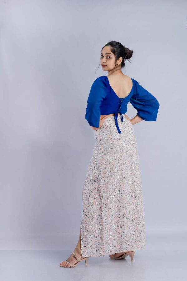 Crossing dark blue crop top and flower printed skirt